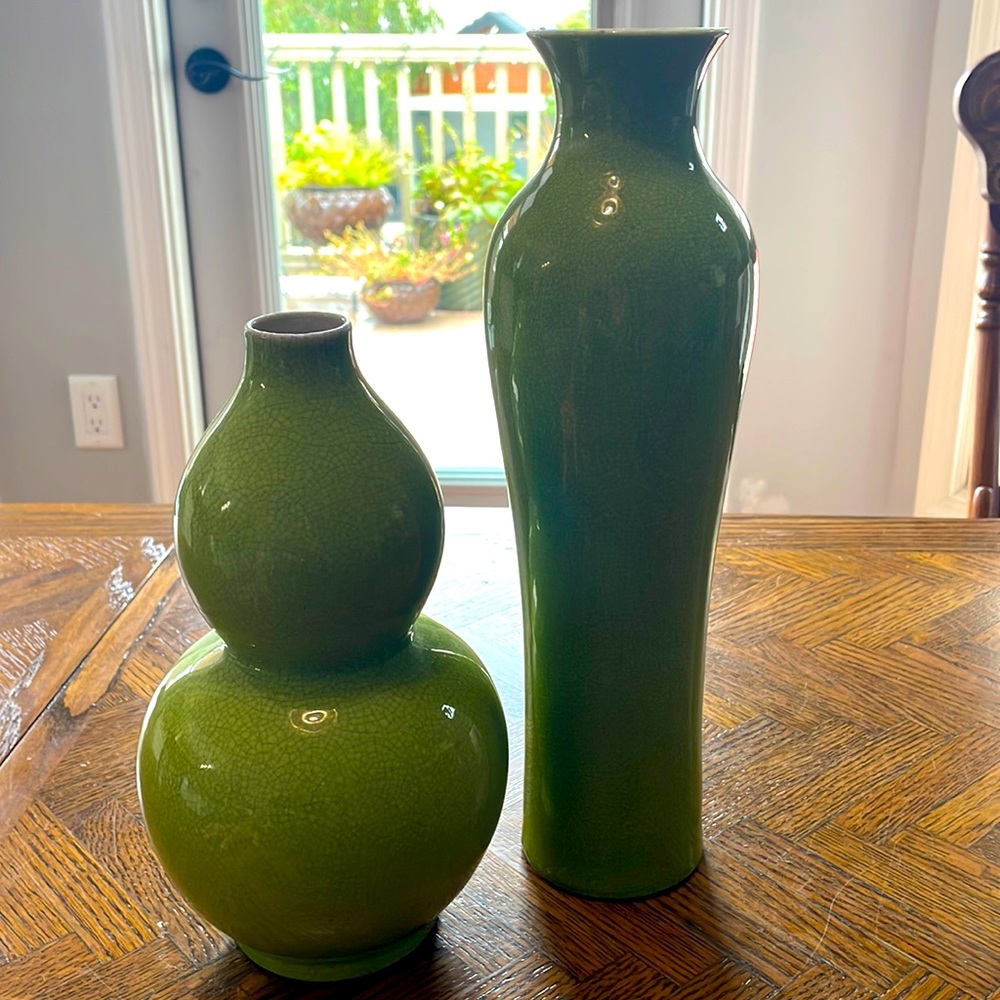 2 pale green vases